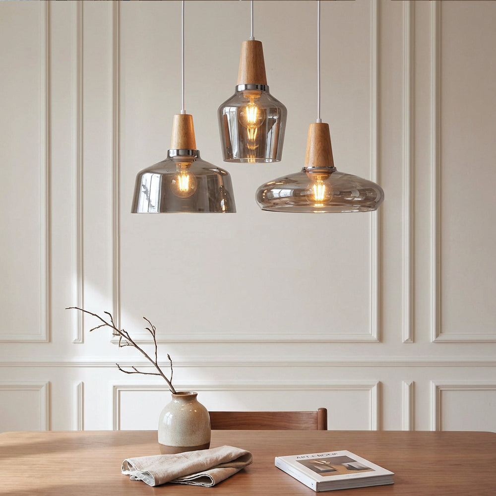 Antique Glass Coated Wood Pendant Lights three styles over a dining table