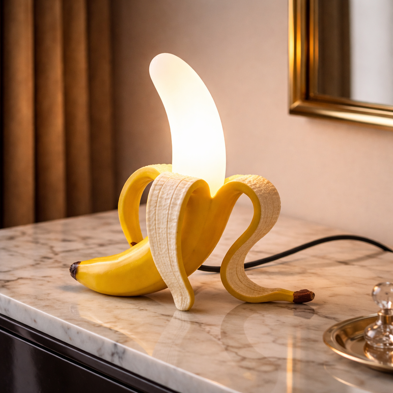 Banana Lights Art Deco Table Lamps yellow banana lamp glowing on a marble table