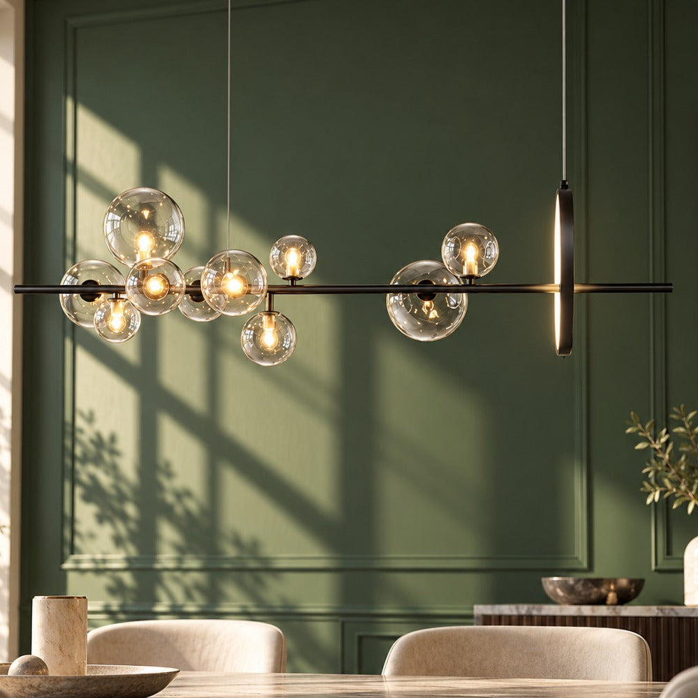 Bubble Glass Ball Metal Ring Chandelier bubble globes with brass ring over a dining area