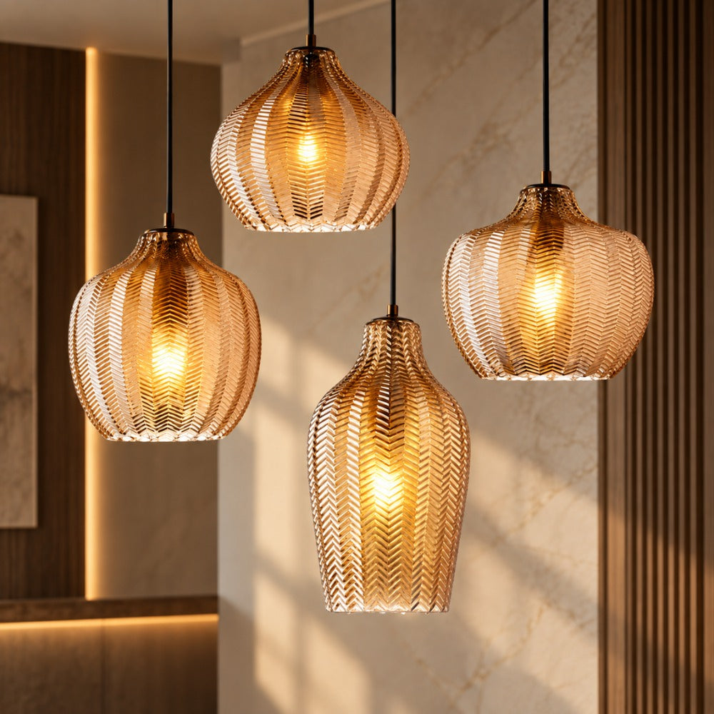 Contemporary Zigzag Glass Pendant Light with four amber glass shades glowing against a warm wood-panelled wall