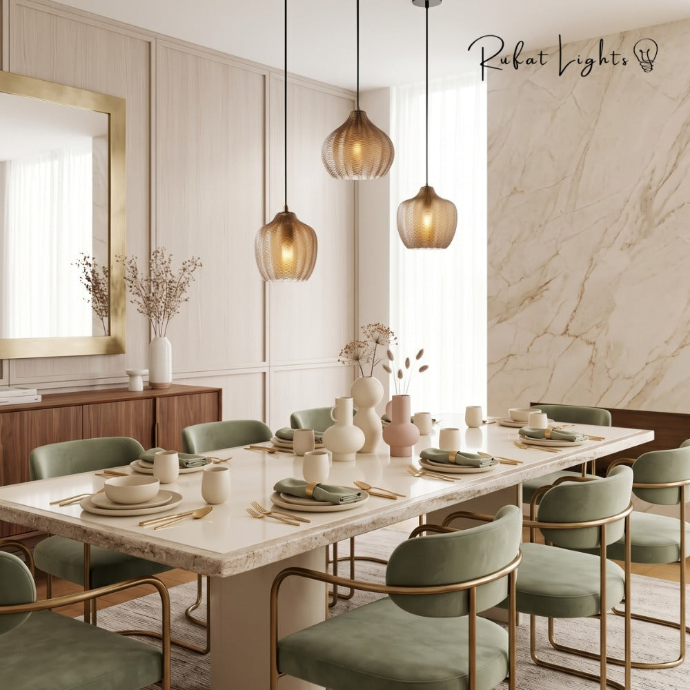 Contemporary Zigzag Glass Pendant Light cluster above a marble dining table with green chairs