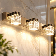 Crystal Sconce LED Wall Lamp 3 Heads/9W crystal cubes on a marble wall