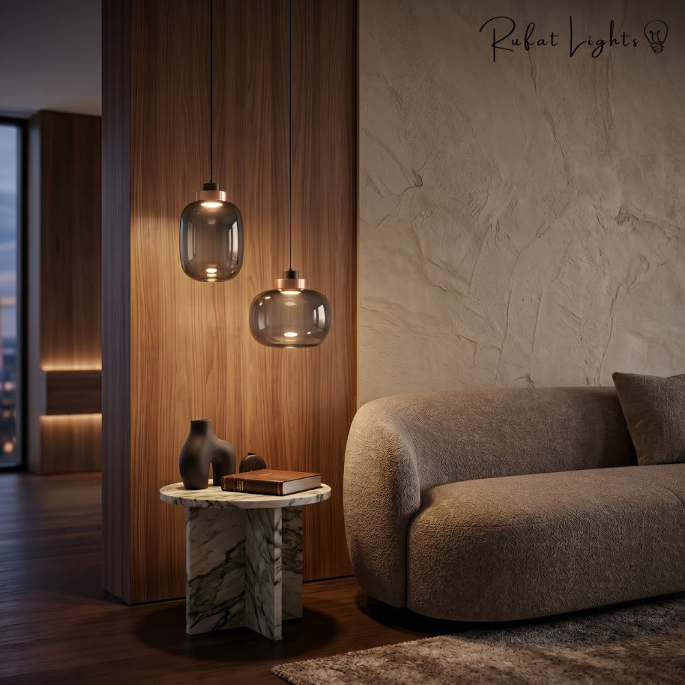 Designer Cylinder Hallow Glass Pendant Light pair beside a sofa