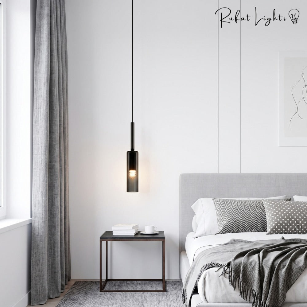 Modern Cylindrical Glass Pendant Light single beside a bed