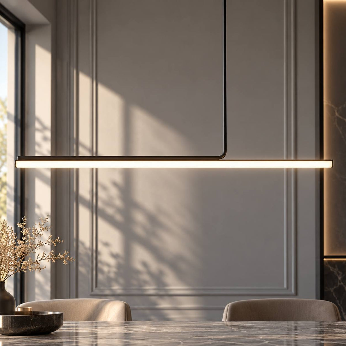 Elegance Modern Long Tube Pendant Light black long tube LED pendant glowing over a dining table