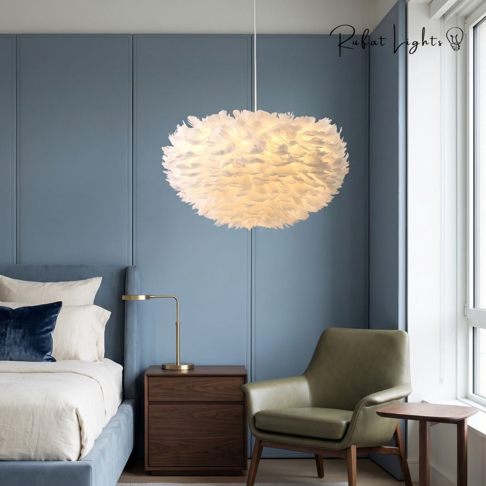 Feather Cloud Fairy Goose Pendant Lamp white above a reading chair