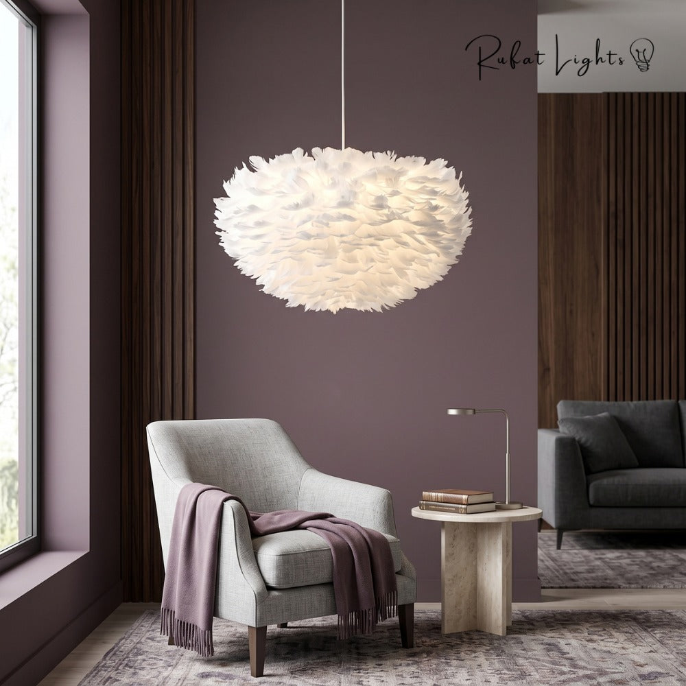 Feather Cloud Fairy Goose Pendant Lamp white above an armchair