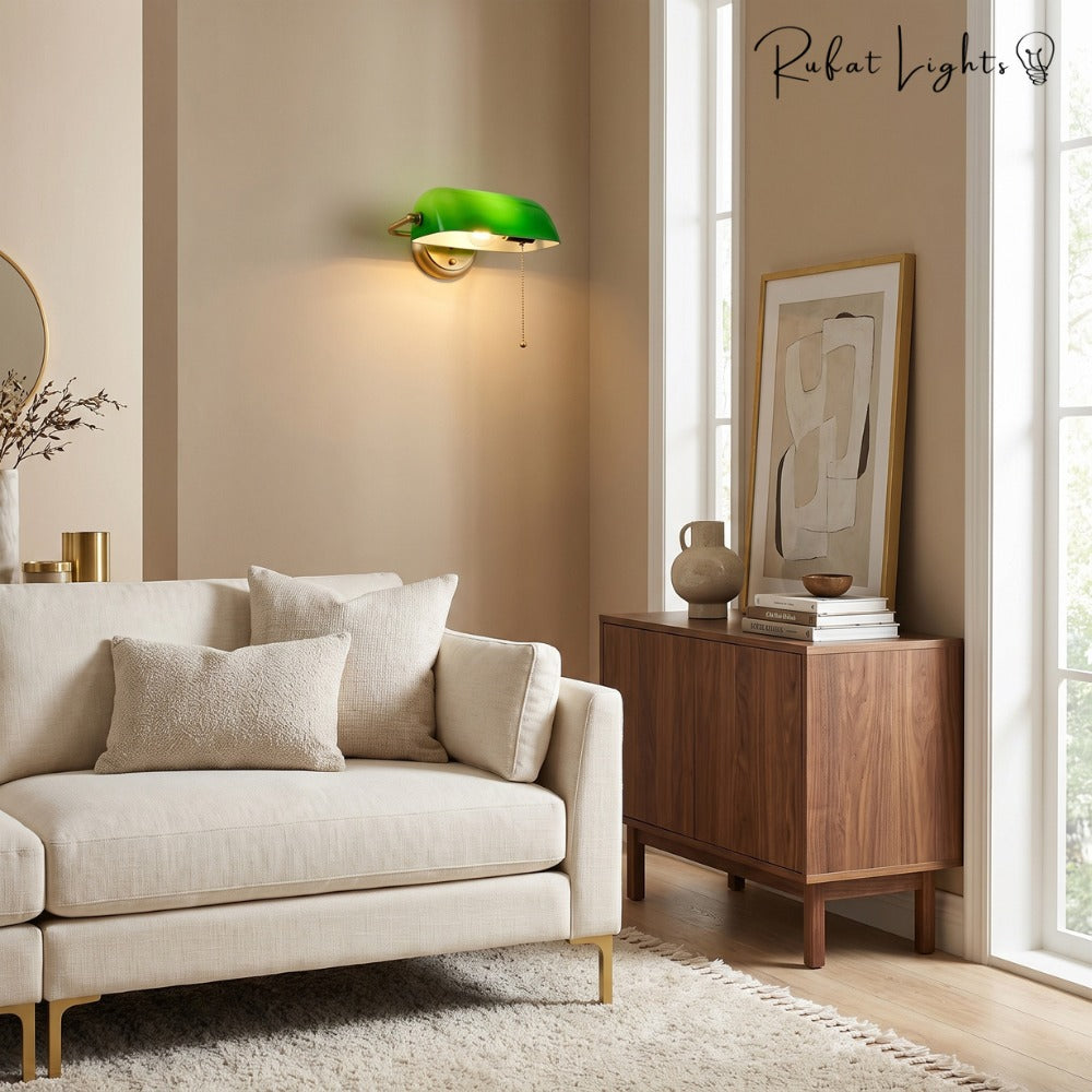 Industrial Vintage Green Banker Wall Lamp above a cream sofa in a living room