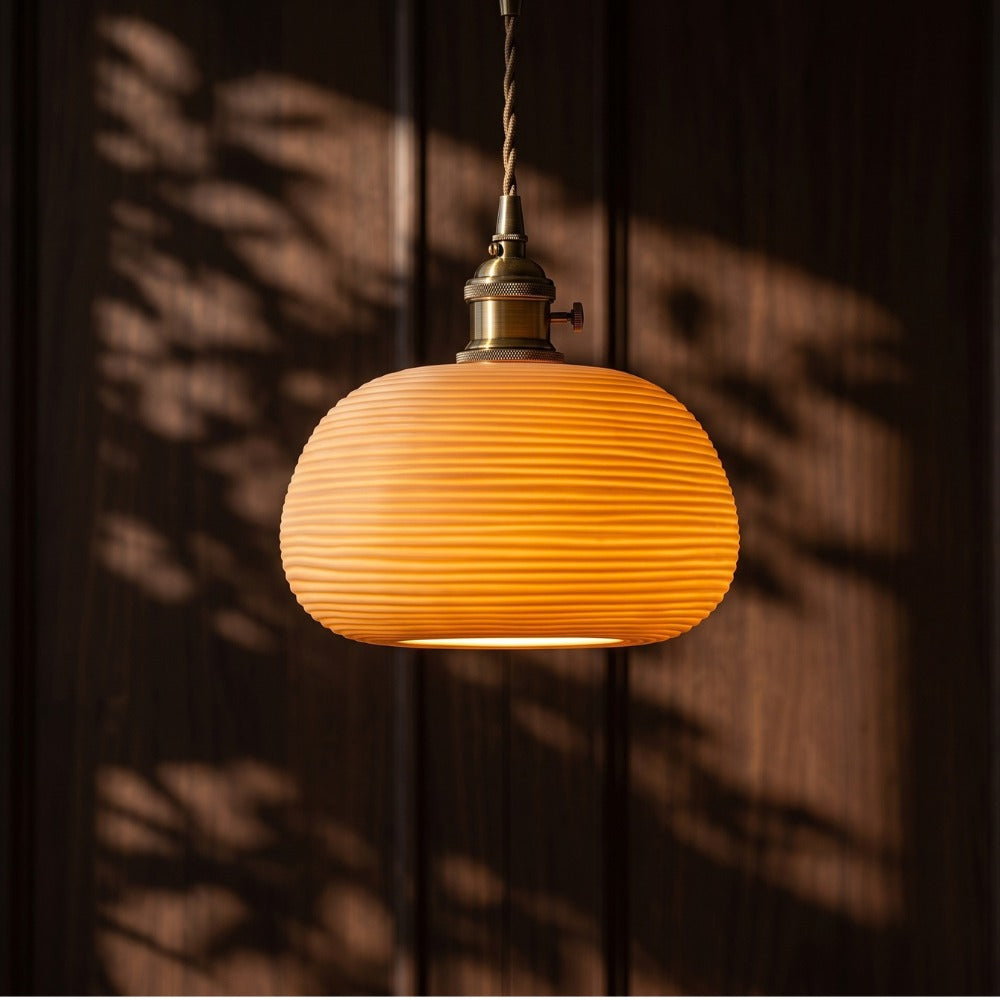 Handcrafted Ceramic Lampshade Pendant Light Dish against a dark wall