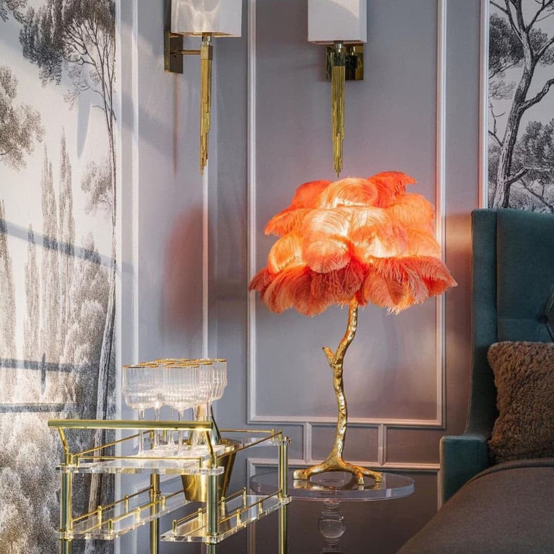 Luxury Ostrich Feather Resin LED Floor/Table Lamp table lamp in orange on a gold bar cart