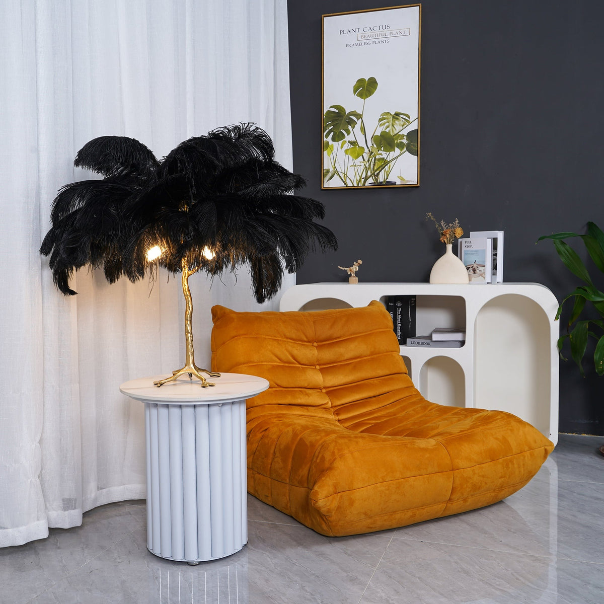 Luxury Ostrich Feather Resin LED Floor/Table Lamp table lamp in black beside an orange lounge chair
