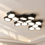 Modern Geometry Alloy LED Ceiling Chandeliers Black and White hexagons on a sunlit ceiling