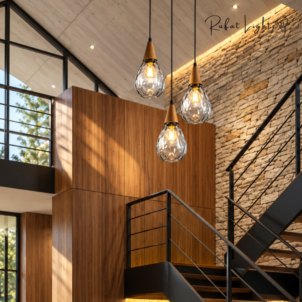 Modern Glass Water Drop Lampshade Pendant lamp trio in a foyer with stairs