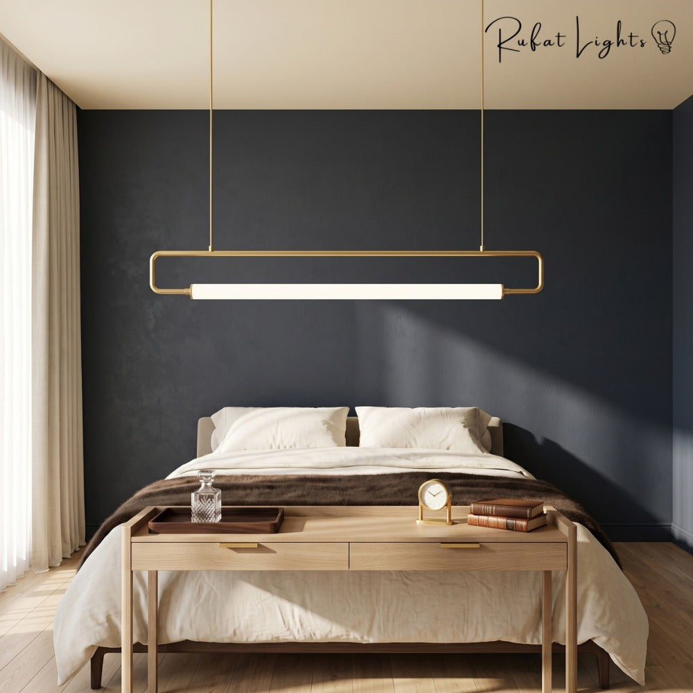 Modern LED Tube Pendant Lights Gold above a bed