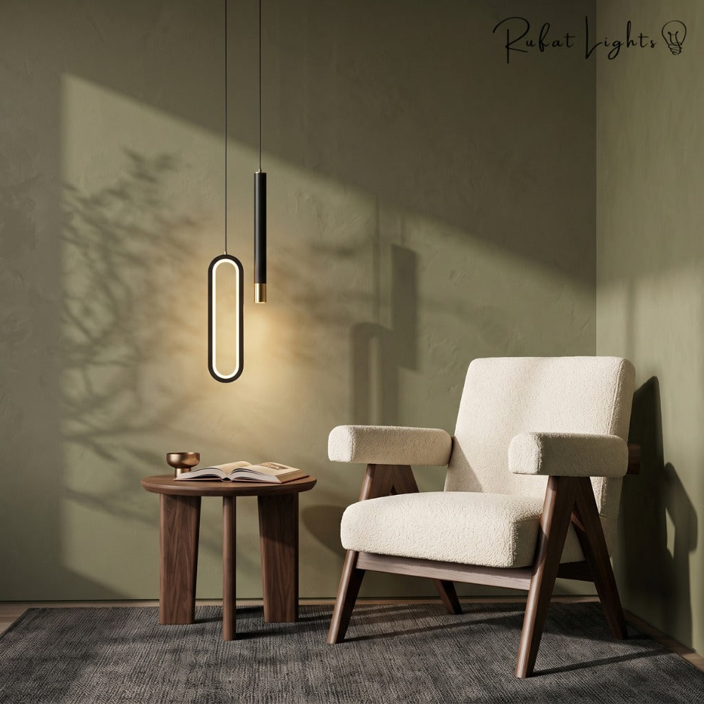Modern Lustre Minimalist LED Pendant Lights Black beside an armchair