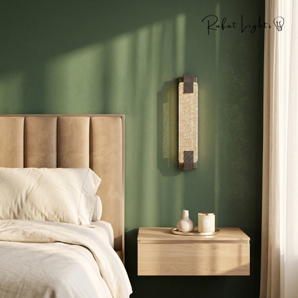 Modern Luxury Crystal Rectangular Bubble Wall Lamp beside a bed