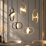 Modern Magic Eye Led Pendant Lights group in gold and black