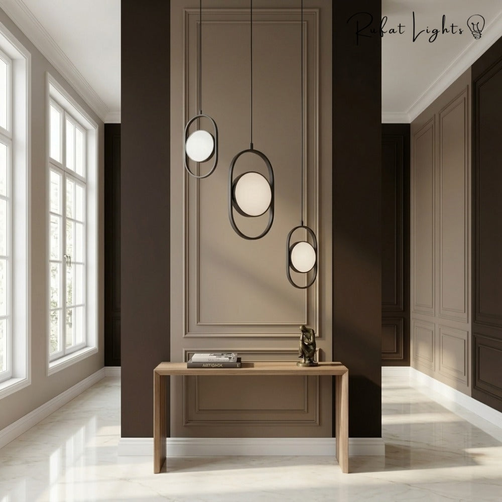 Modern Magic Eye Led Pendant Lights in a foyer