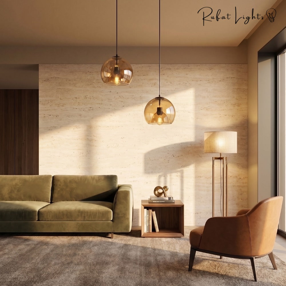 Modern Minimalist Glass Ceiling Light amber pendants in a living room with a green sofa