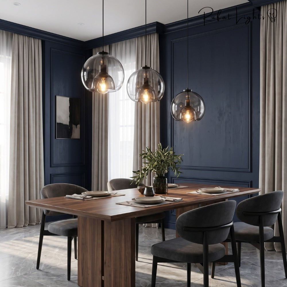 Modern Minimalist Glass Ceiling Light grey pendants above a wooden dining table