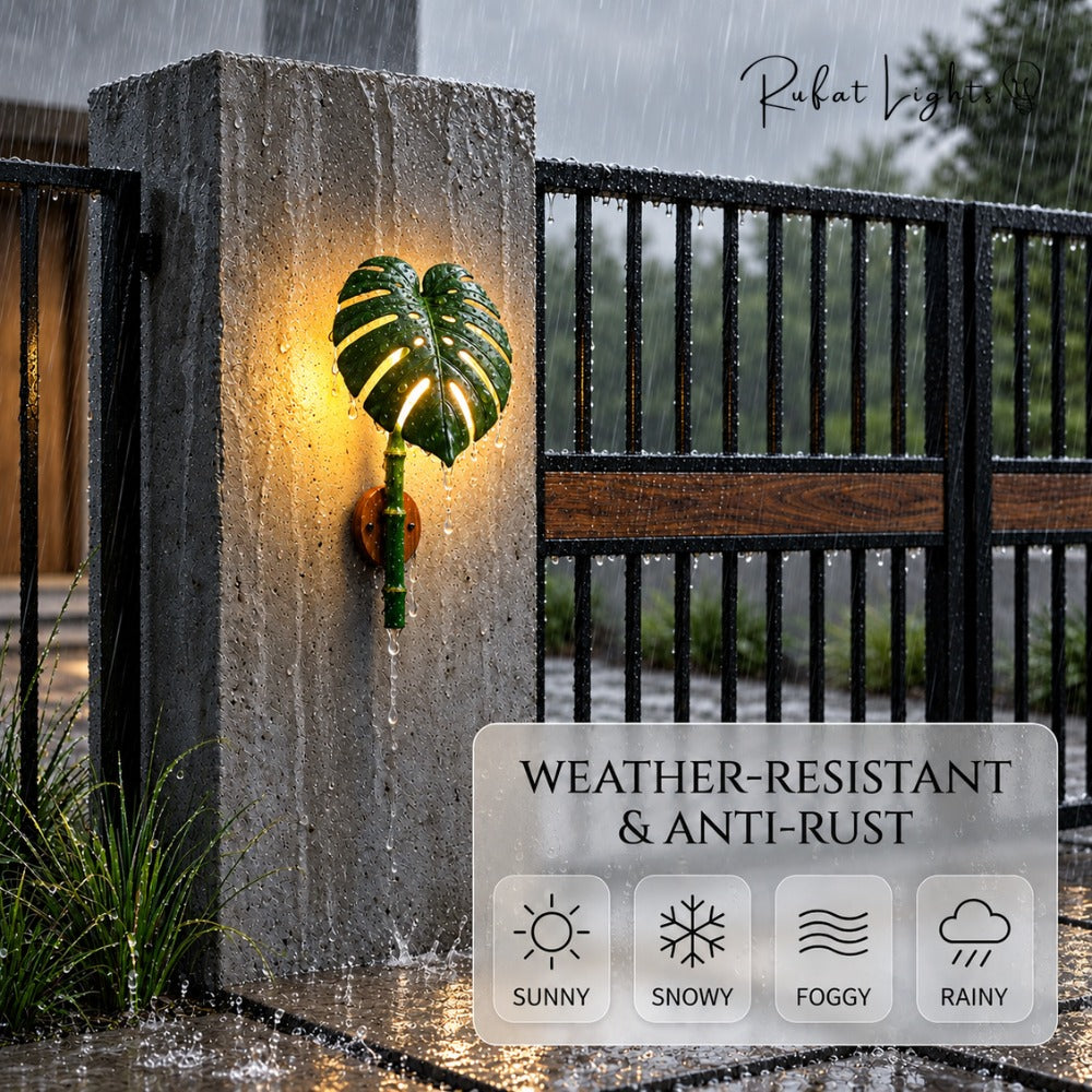 Monstera Leaf Bamboo Outdoor Wall Lamp on a stone gate pillar, weather-resistant and anti-rust