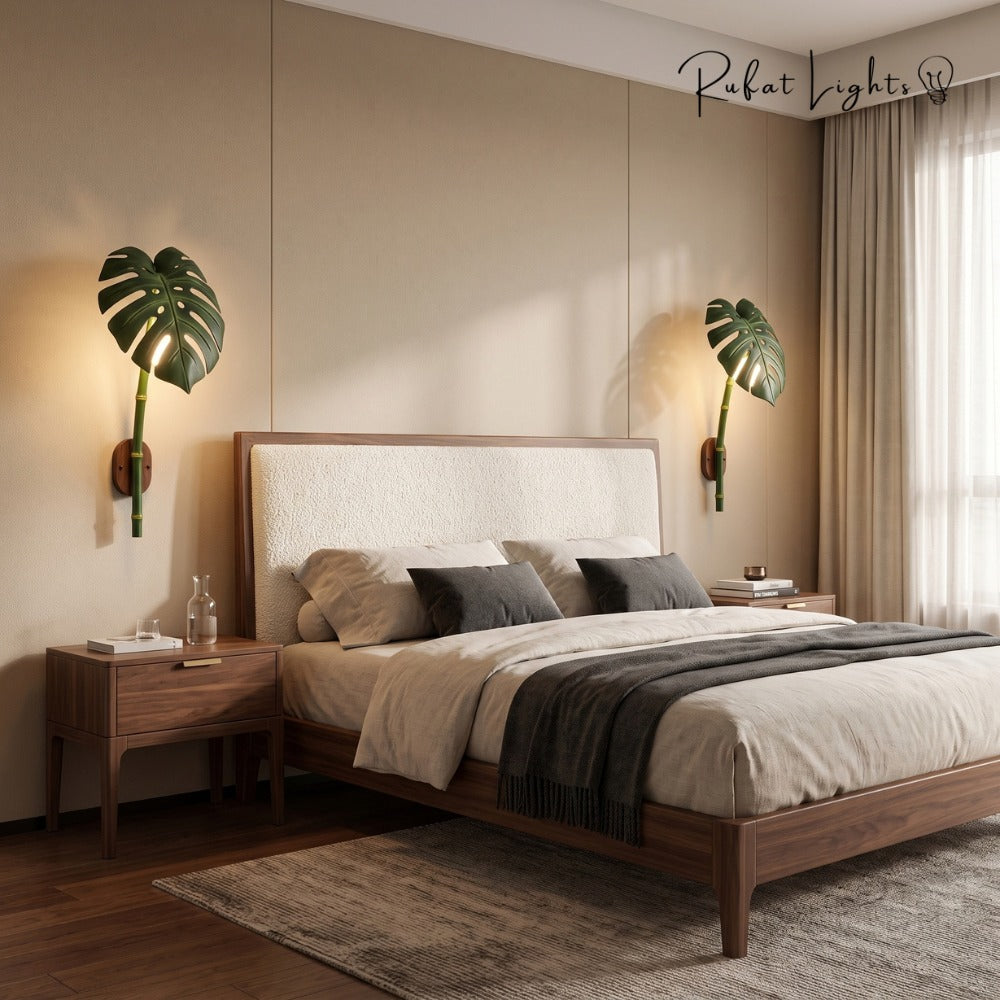 Monstera Leaf Bamboo Outdoor Wall Lamp pair beside a bed