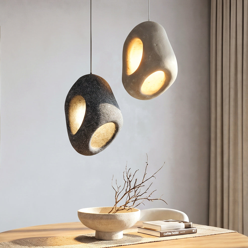 Nature-Inspired Wabi Sabi Nest Pendant Light dark grey and cream pendants over a table