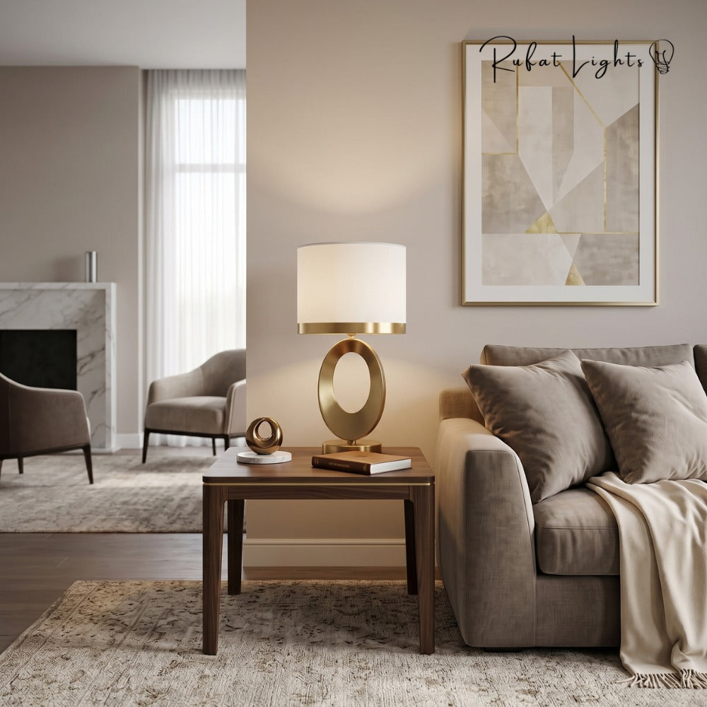 Nordic Luxury Cloth Covered Desk Lamp with white shade on a coffee table in a living room