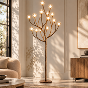 Nordic Rustic Tree Branch Floor Lamp tree branch floor lamp with glass bubble heads in a bright sunlit living room