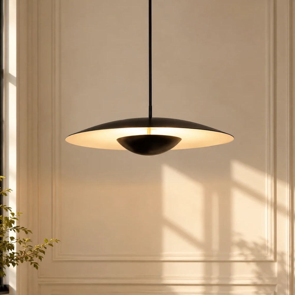 Nordic Wood Grain Pendant Light black wood-grain disc pendant glowing against a cream panelled wall