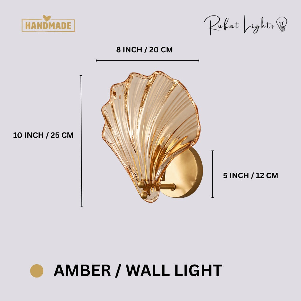 Oceanic Glass Shell Wall Light Amber Wall Light dimensions: 8 in (20 cm) wide, 10 in (25 cm) high, 5 in (12 cm) backplate