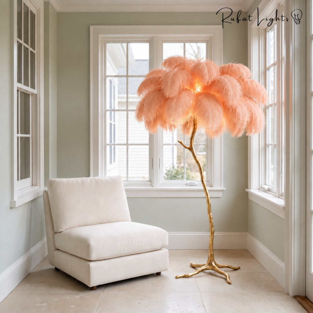 Luxury Ostrich Feather Resin LED Floor/Table Lamp orange beside a white armchair