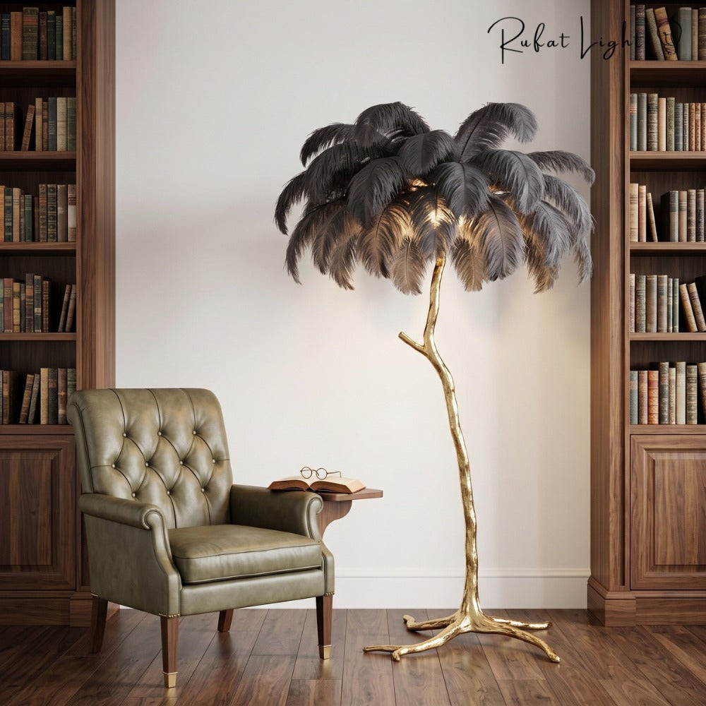 Luxury Ostrich Feather Resin LED Floor/Table Lamp charcoal beside a leather armchair