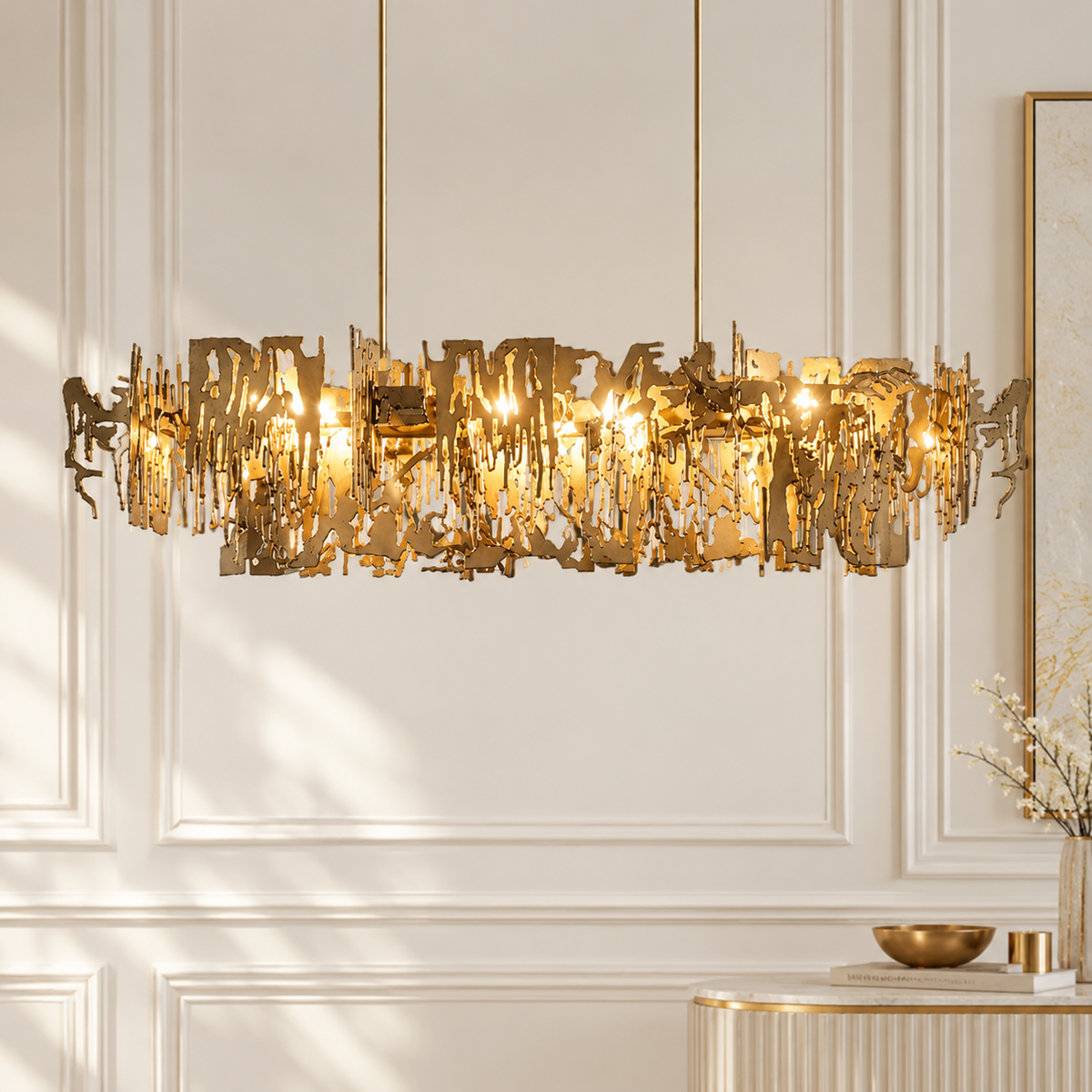 Retro Metal Fragment Art Chandelier Pendant champagne gold metal fragment linear chandelier glowing against a cream panelled wall