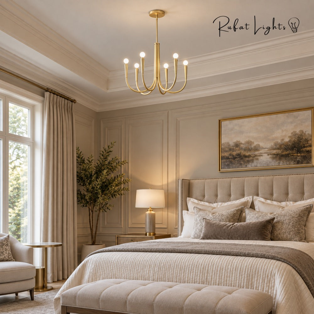 Retro Style Swoop Arm Luxury Chandelier Lamps in gold above the bed in an elegant bedroom