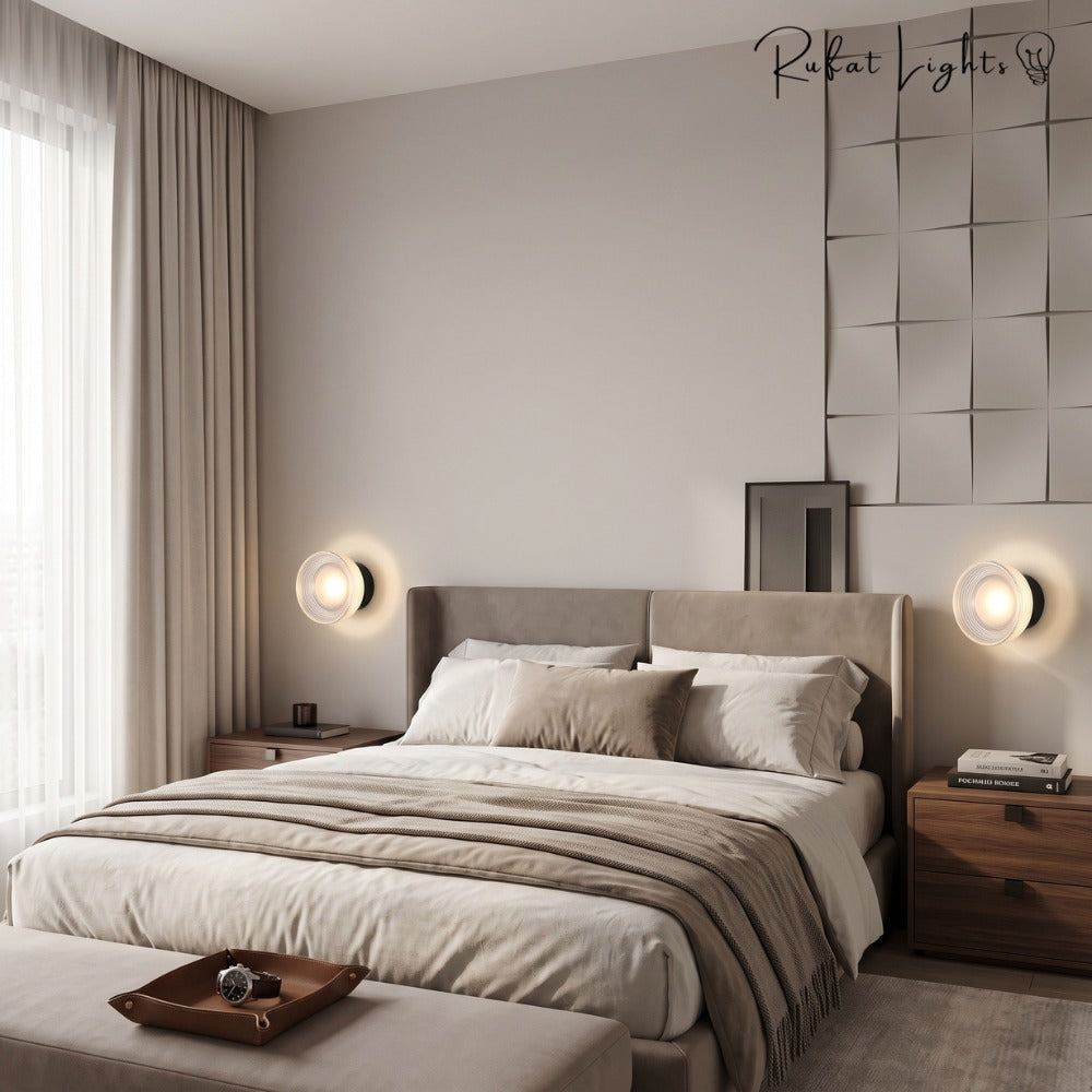 Round Textured Glass Wall Lamp in gold pair on a textured bedroom wall