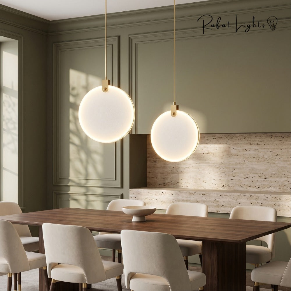 Simple Marble Round Crystal Villa Pendant Lamps pair over a dining table