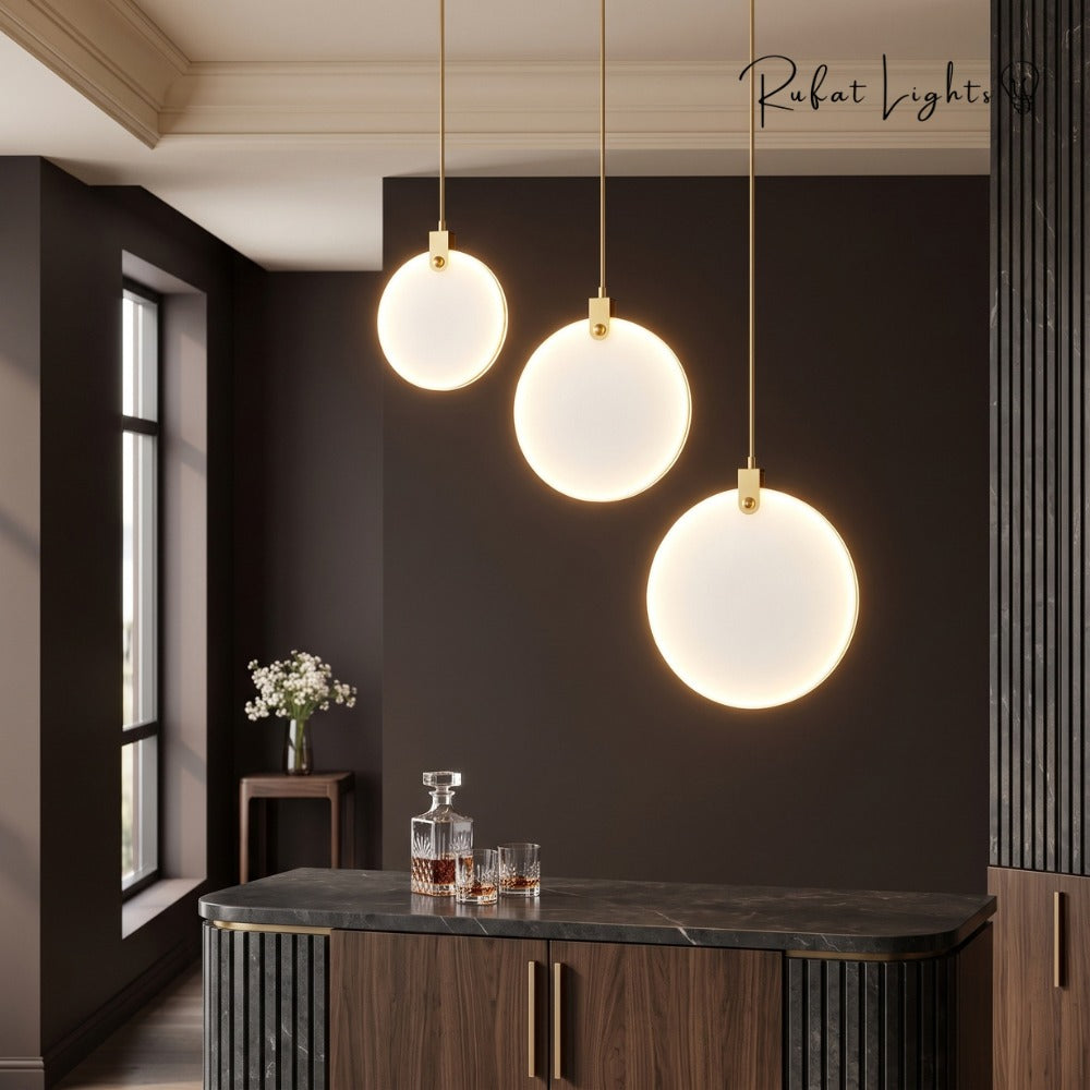 Simple Marble Round Crystal Villa Pendant Lamps trio over a kitchen counter