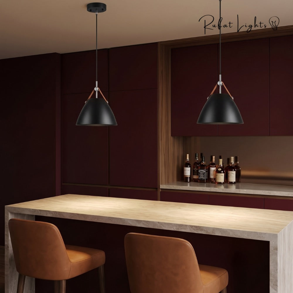 Strapped Charm Cone Pendant Light black pair above a kitchen bar