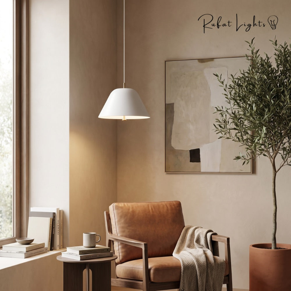 Vintage Nordic Pendant Light in white above a leather armchair in a reading corner