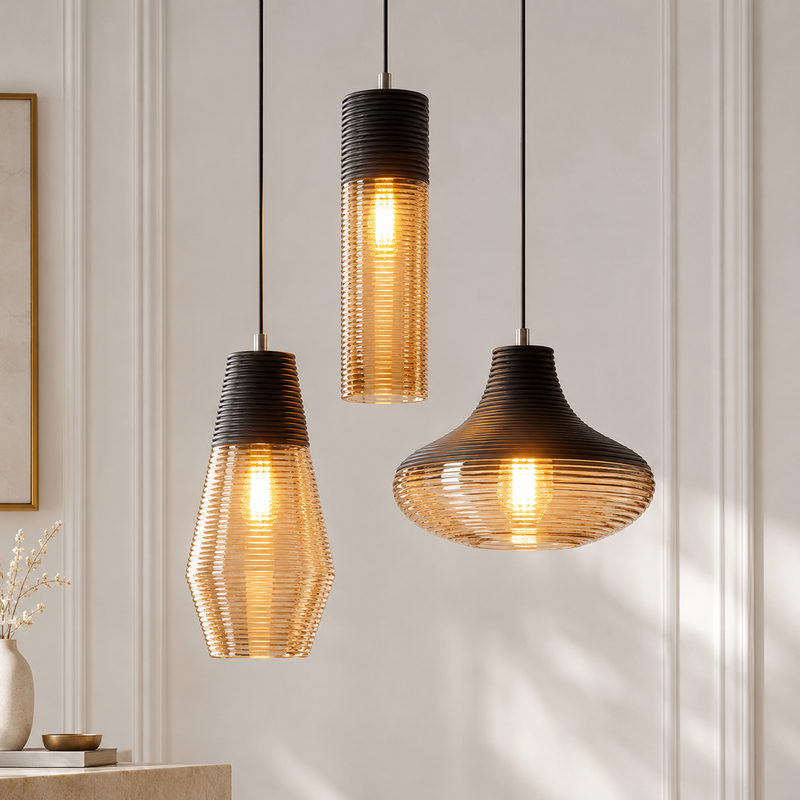Vintage Stripe Glass Pendant Lights hexagon, tube and bowl ribbed amber glass pendant lights glowing against a white panelled wall