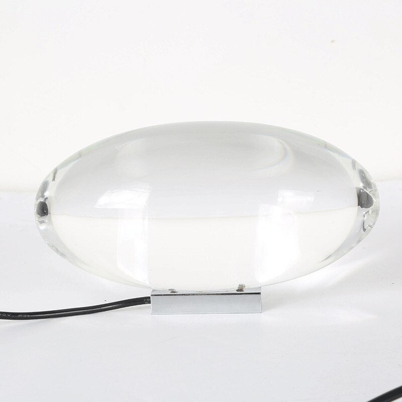 Mystical Radiance Crystal Sky Lamp close-up: clear oval crystal dome on a chrome base with black USB cable