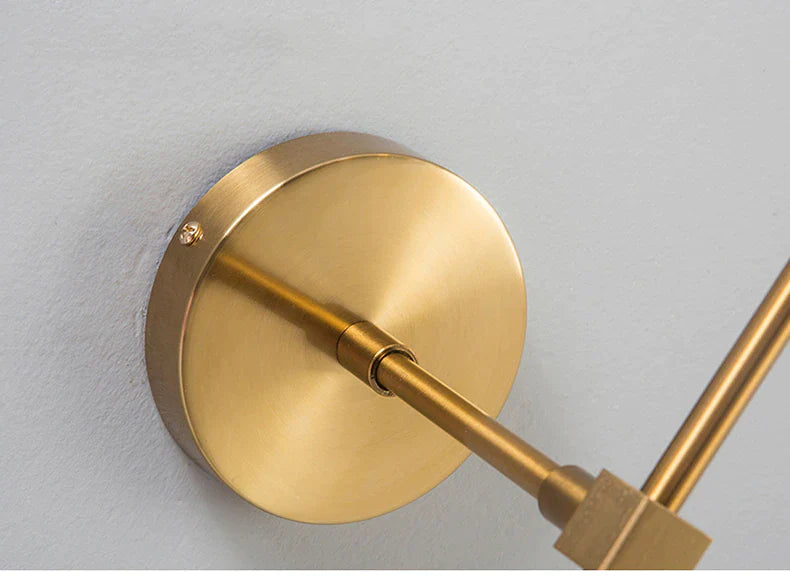 Gold Base Glass Globe Wall Light
