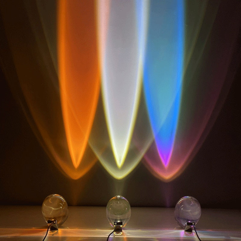 Three Mystical Radiance Crystal Sky Lamps with clear crystal domes projecting Sunset, White and Rainbow light beams