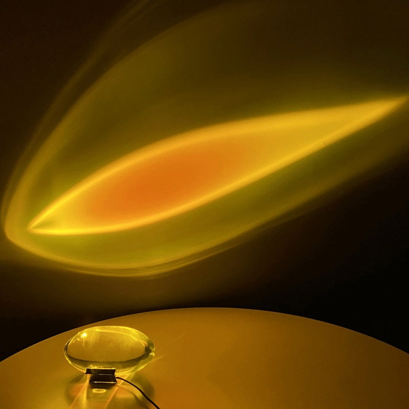 Mystical Radiance Crystal Sky Lamp in Sunset projecting a golden orange leaf-shaped glow onto the wall