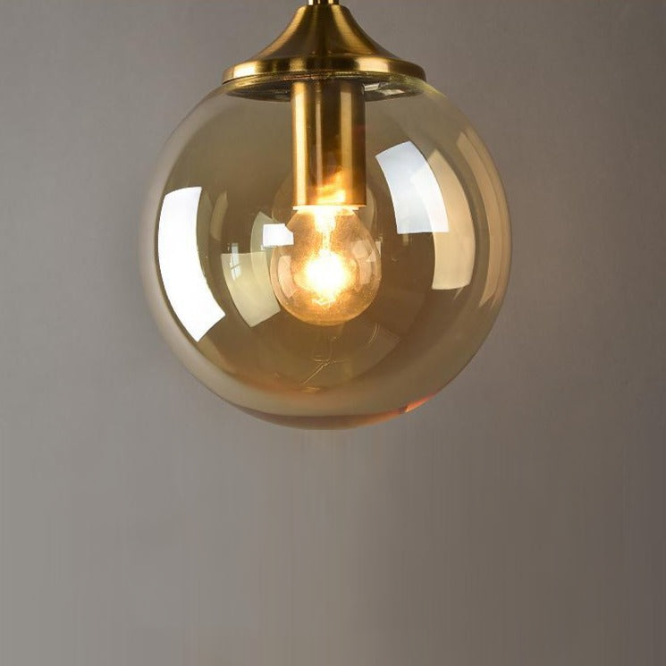 Gold Base Glass Globe Wall Light