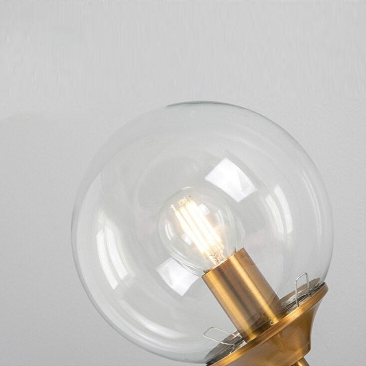 Gold Base Glass Globe Wall Light