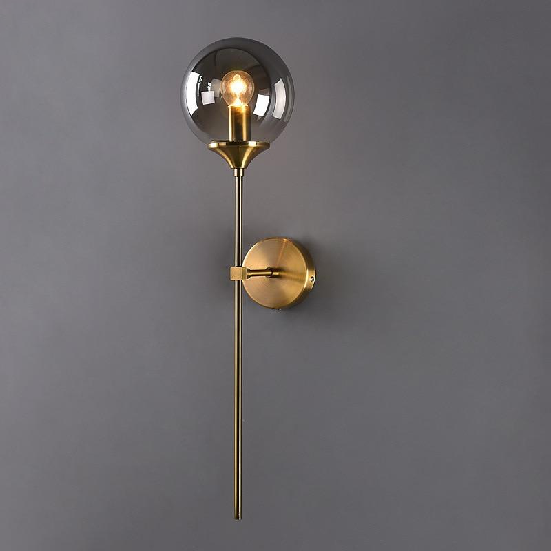 Gold Base Glass Globe Wall Light
